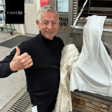 Graham Stewart, Founder of Fibre52, at Cotton Incorporated with a finished cotton fabric
